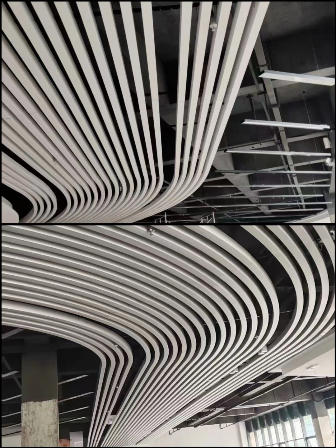 White curved aluminum baffle installation with sweeping parallel profiles and exposed suspension rails